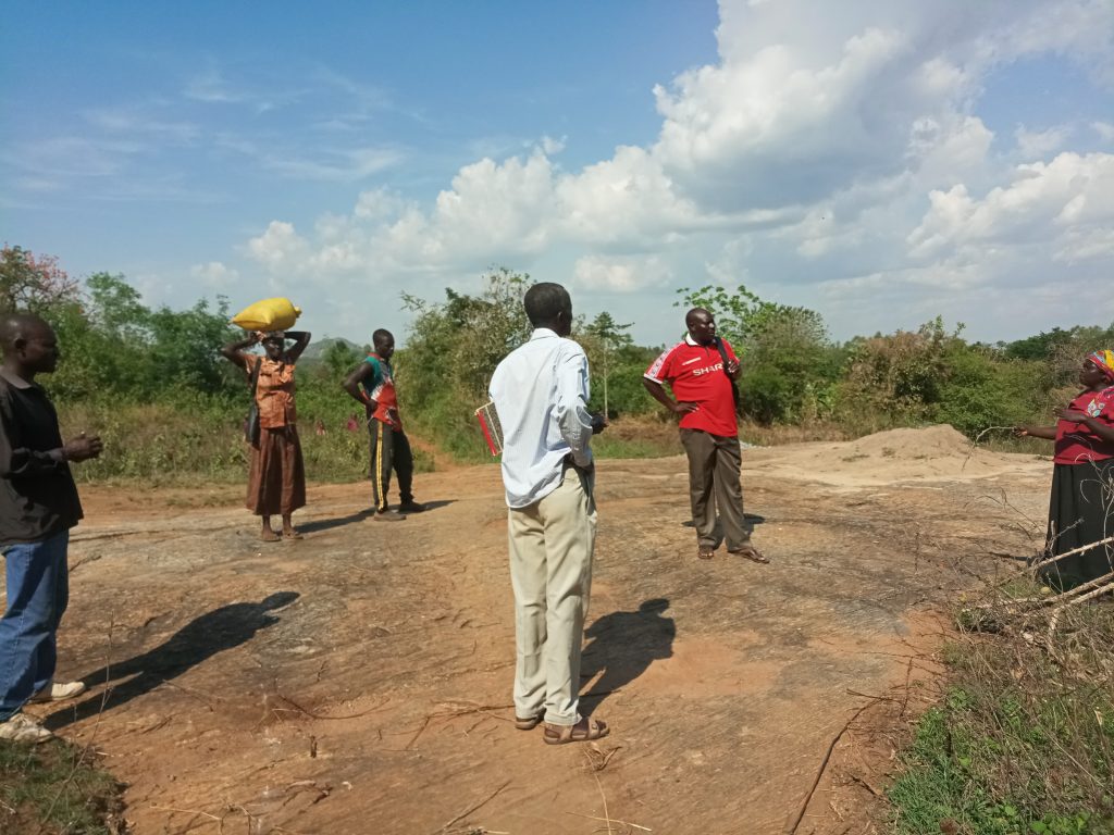 “Business professionals conducting ESG consulting session in Uganda focused on climate risk assessment and sustainability strategy”