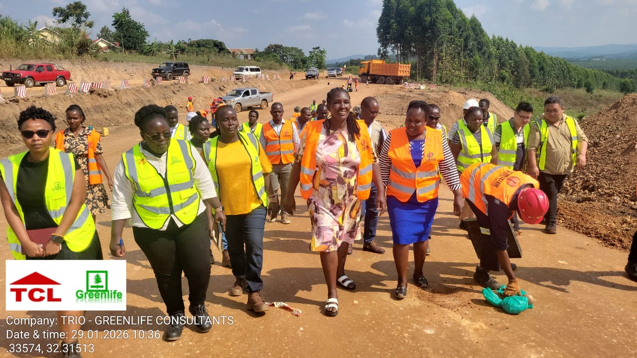 “Environmental experts conducting field assessment for infrastructure project in Uganda”