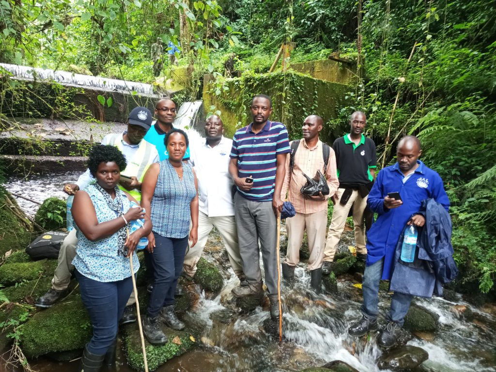 “Local community members in Northern Uganda participating in forest conservation and tree planting initiative”